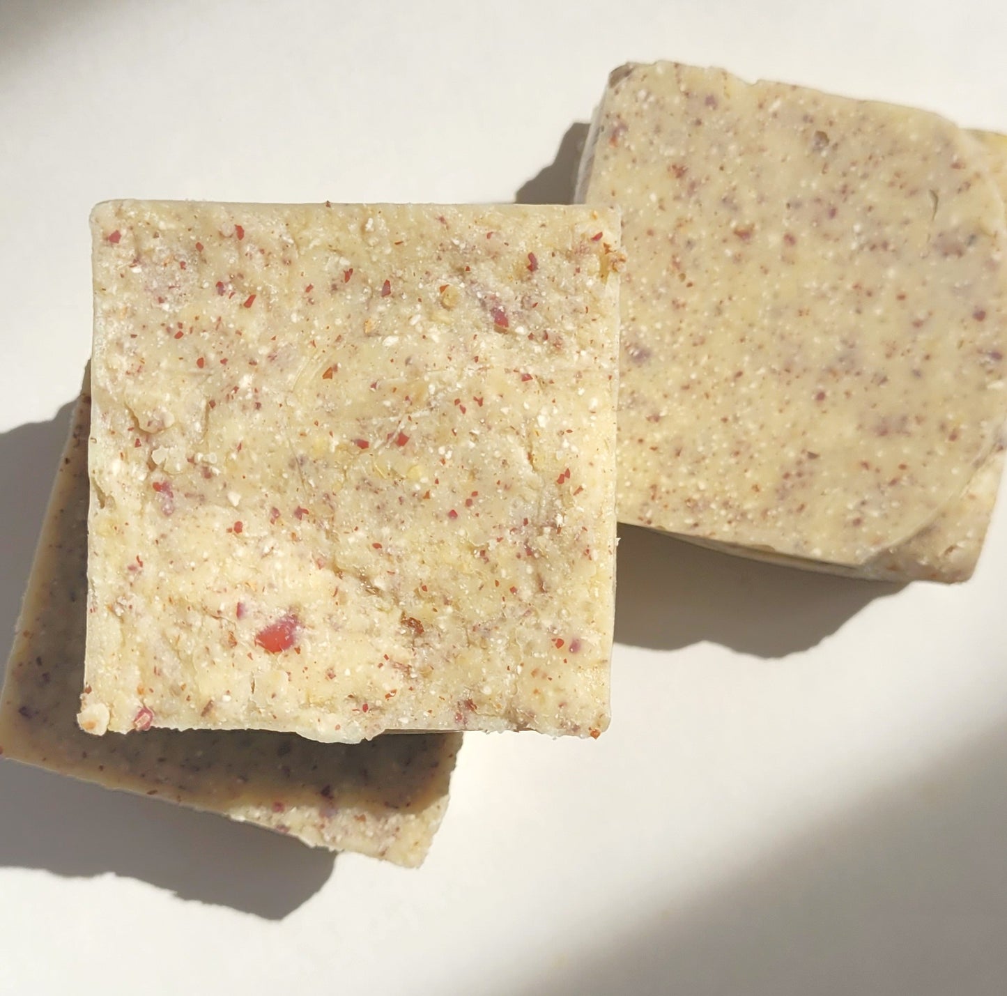 3 squares of solid body lotion.